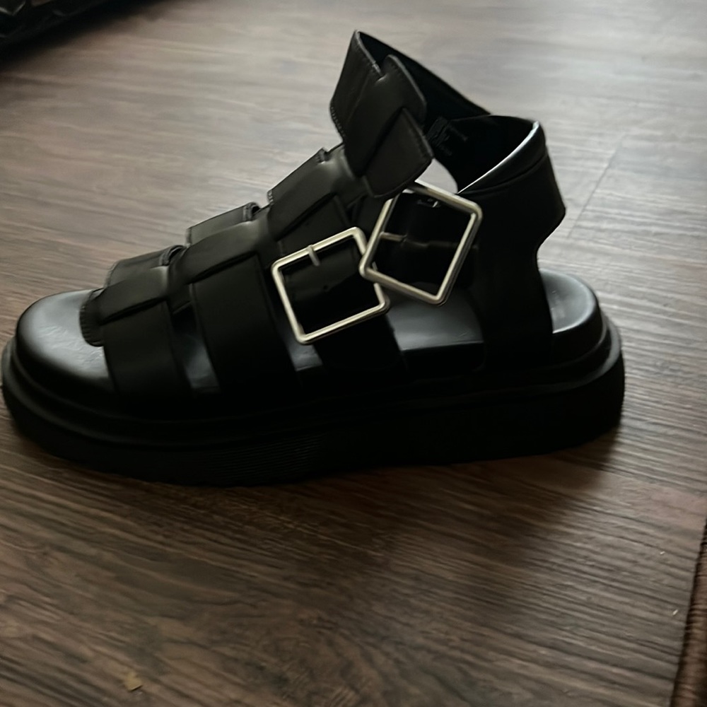 Black platform sandals.